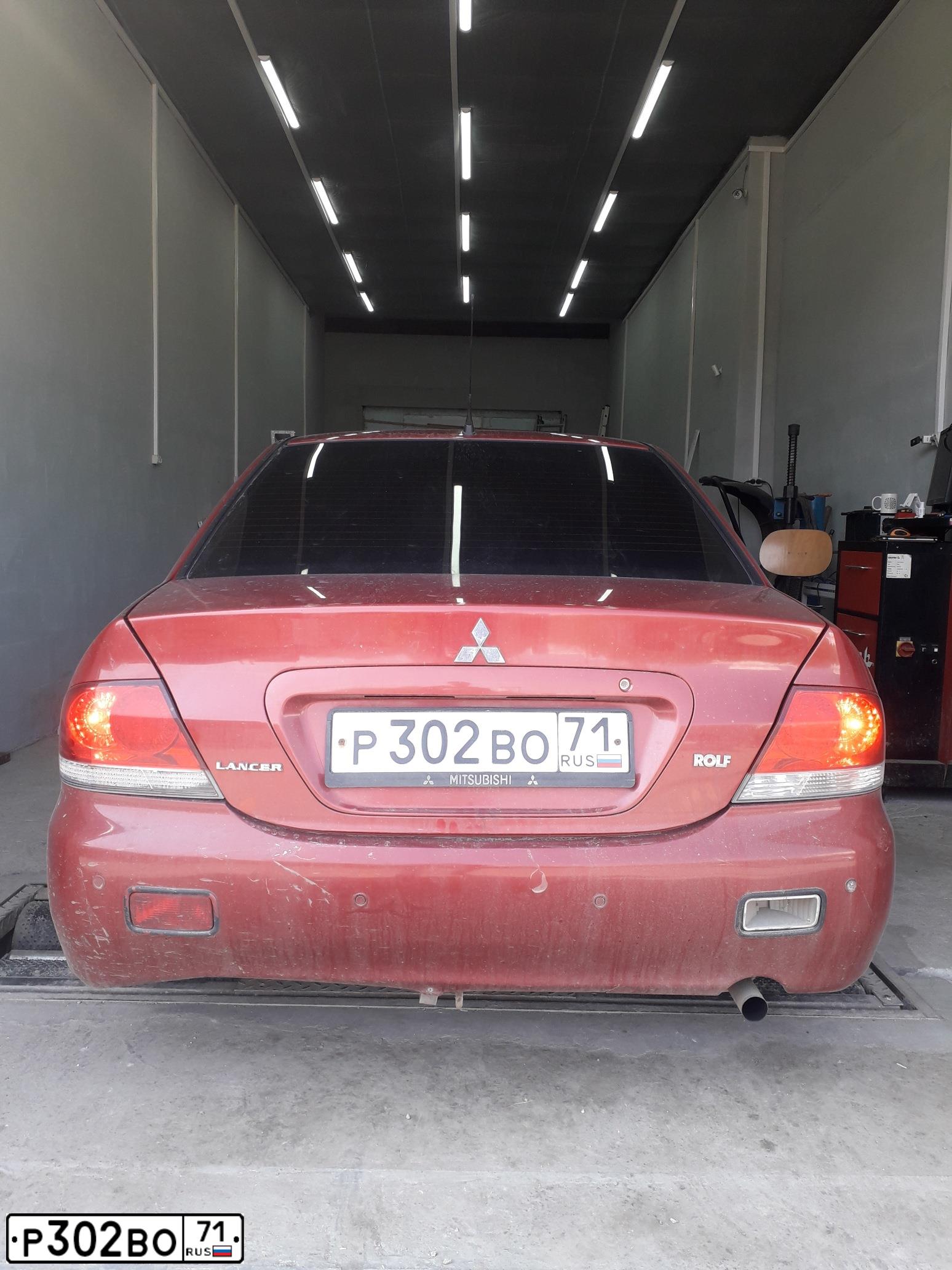 Фото автомобиля MITSUBISHI LANCER, 2006 — госномер К428ТС71. Цвет: Красный