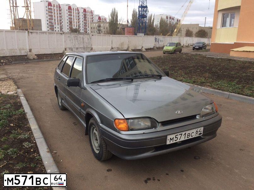 Фото автомобиля LADA 2114 SAMARA, 2005 — госномер М571ВС64. Цвет: СРЕДНИЙ СЕРО-ЗЕЛЕНЫЙ МЕТАЛЛ