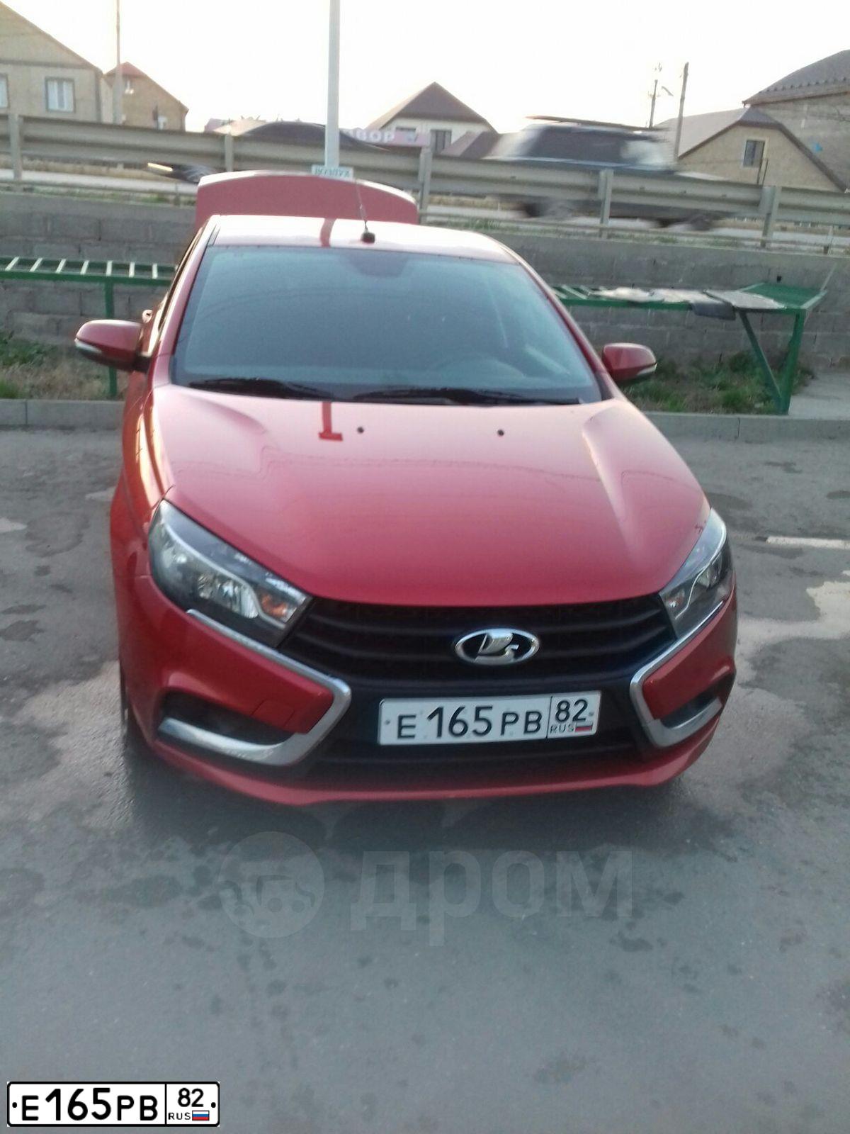 Фото автомобиля LADA VESTA, 2017 — госномер Е165РВ82. Цвет: КРАСНЫЙ