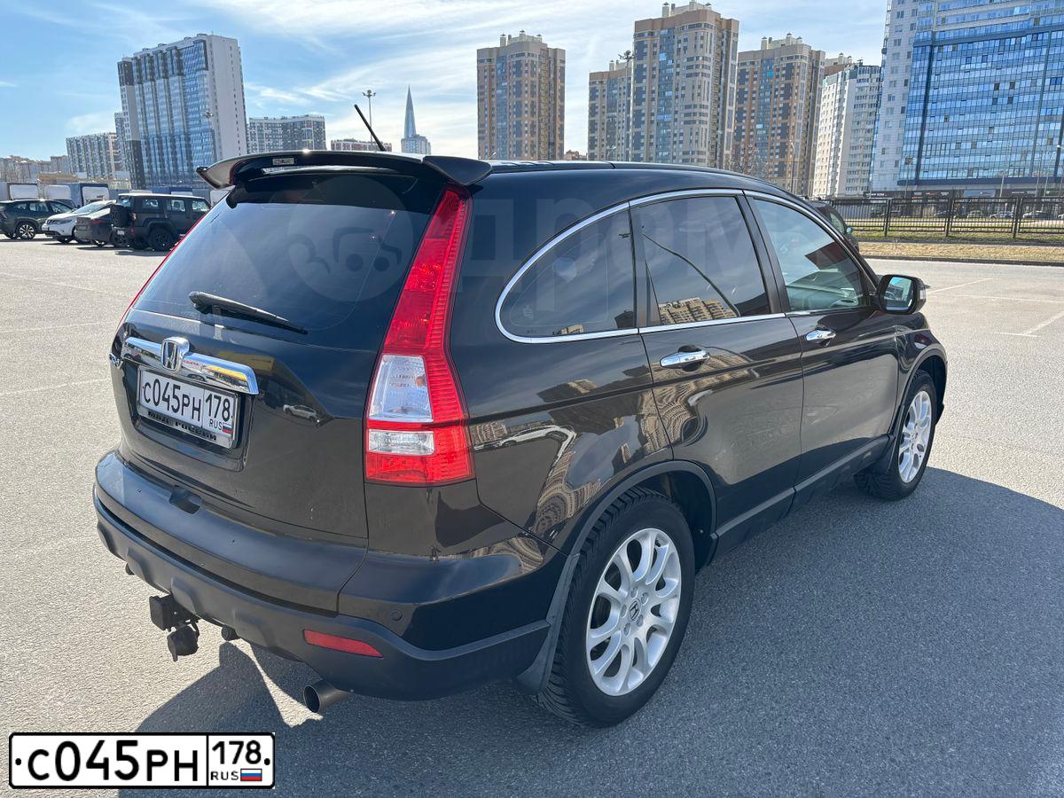 Фото автомобиля HONDA CR-V, 2009 — госномер С045РН178. Цвет: ТЕМНО-КОРИЧНЕВЫЙ