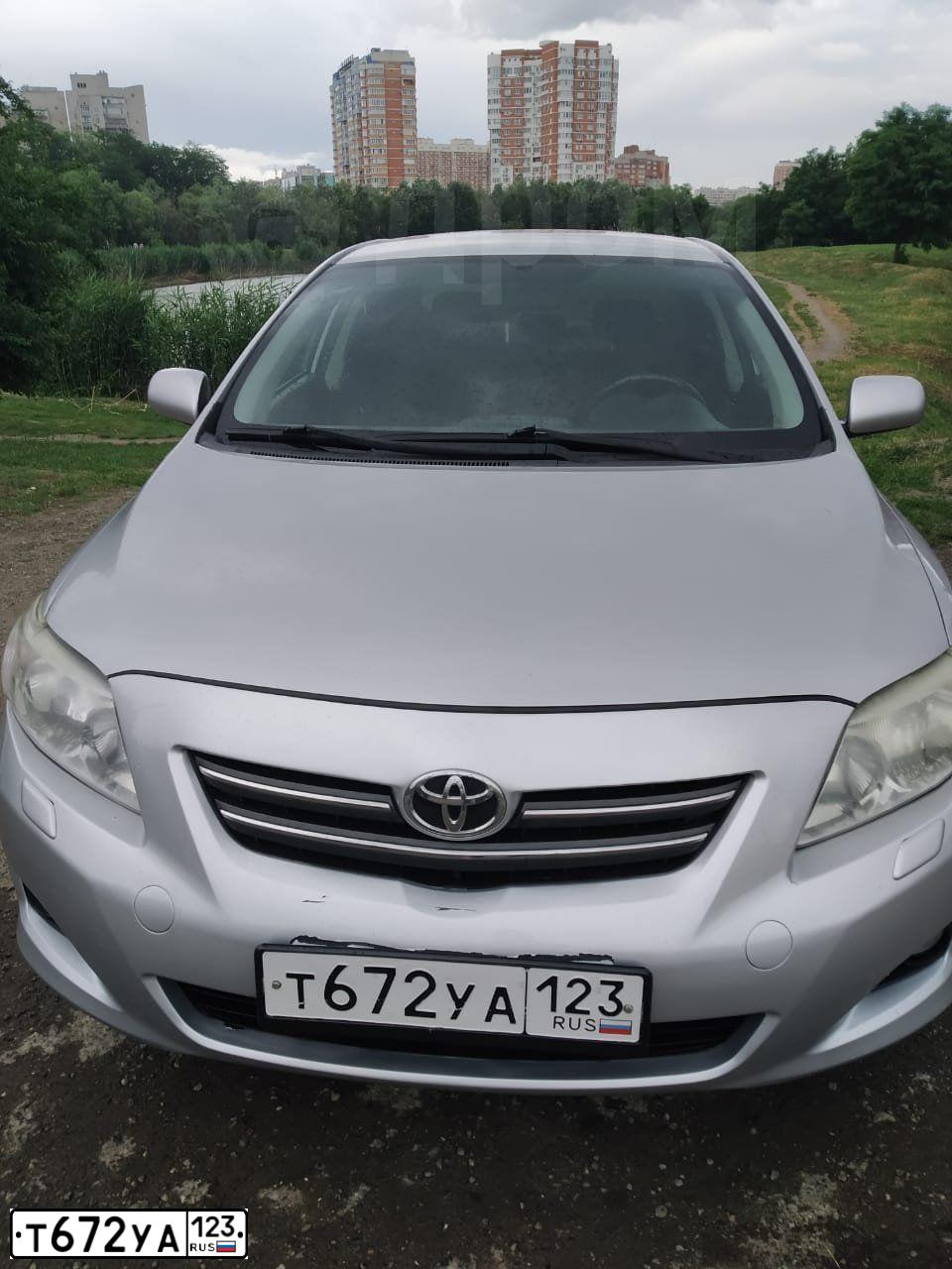 Фото автомобиля TOYOTA COROLLA, 2008 — госномер Р087ВЕ193. Цвет: Серебристый