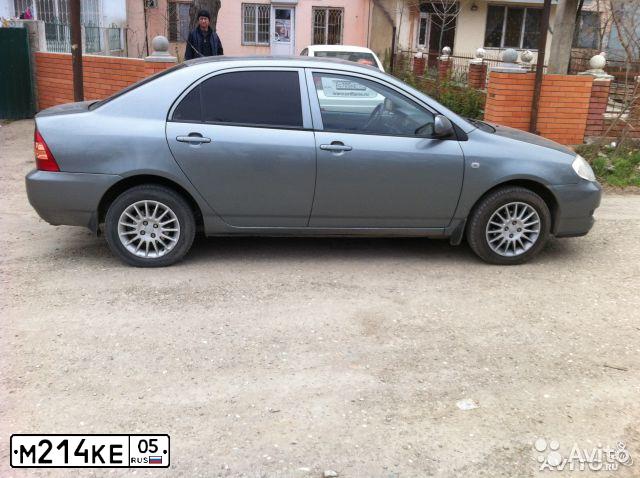 Фото автомобиля TOYOTA COROLLA, 2006 — госномер А233НР105. Цвет: Серый