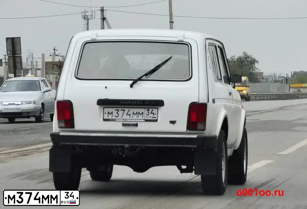 Фото автомобиля LADA 2121 NIVA, 1999 — госномер М793АР134. Цвет: ЯРКО БЕЛЫЙ