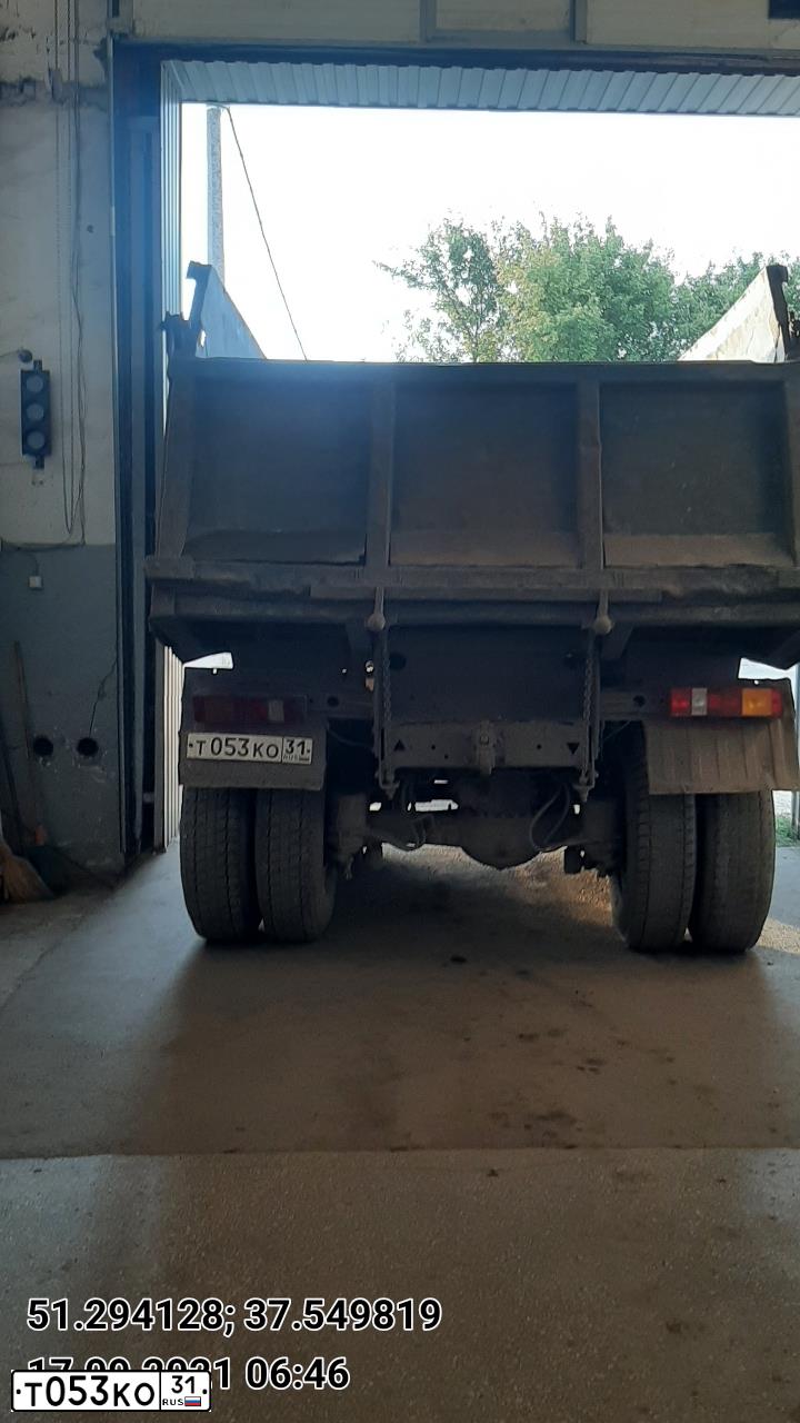 Фото автомобиля KAMAZ 65115 /6X4/, 2000 — госномер Т053КО31. Цвет: ЗЕЛЕНЫЙ
