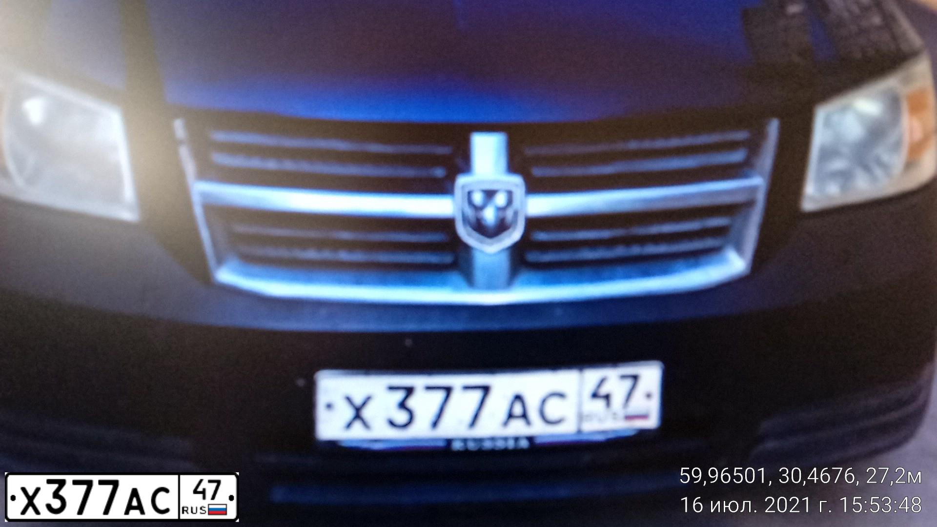 Фото автомобиля DODGE GRAND CARAVAN, 2008 — госномер Х377АС47. Цвет: ТЕМНО-СИНИЙ
