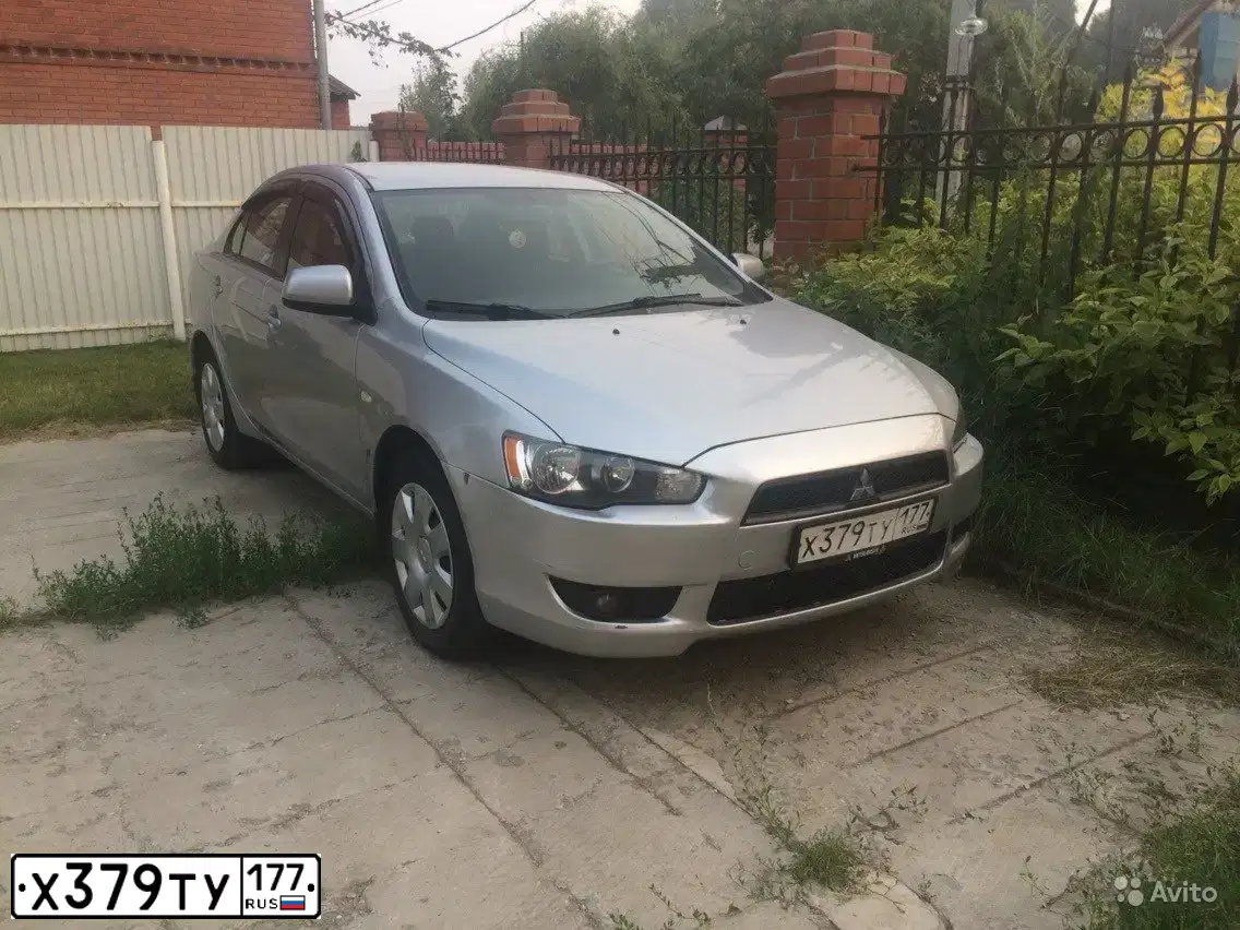 Фото автомобиля MITSUBISHI LANCER, 2007 — госномер Х379ТУ177. Цвет: Серебристый