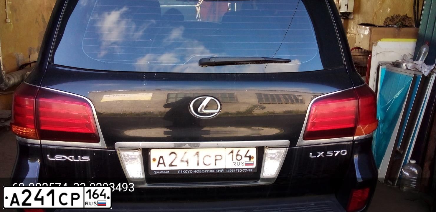 Фото автомобиля LEXUS LX, 2009 — госномер А668УК199. Цвет: ЧЕРНЫЙ