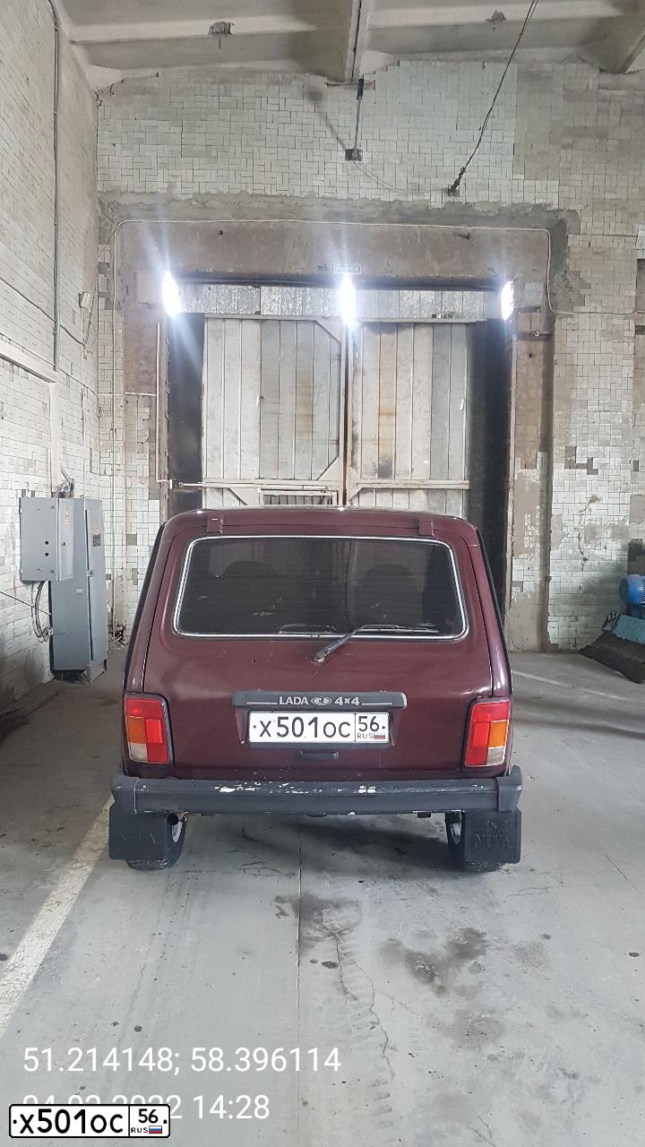 Фото автомобиля LADA 2121 NIVA, 2010 — госномер Е369СУ156. Цвет: ТЕМНО-ВИШНЕВЫЙ