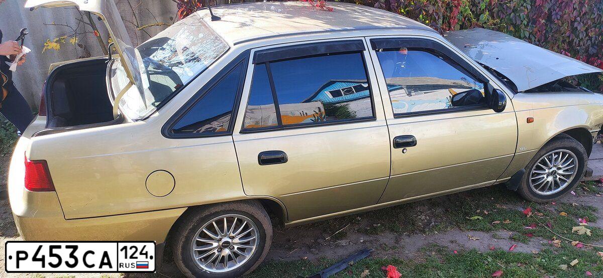 Фото автомобиля DAEWOO NEXIA, 2010 — госномер Н482МУ142. Цвет: ПЕСОЧНЫЙ