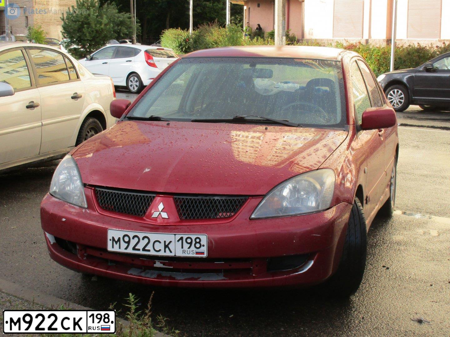 Фото автомобиля MITSUBISHI LANCER, 2005 — госномер М922СК198. Цвет: Красный