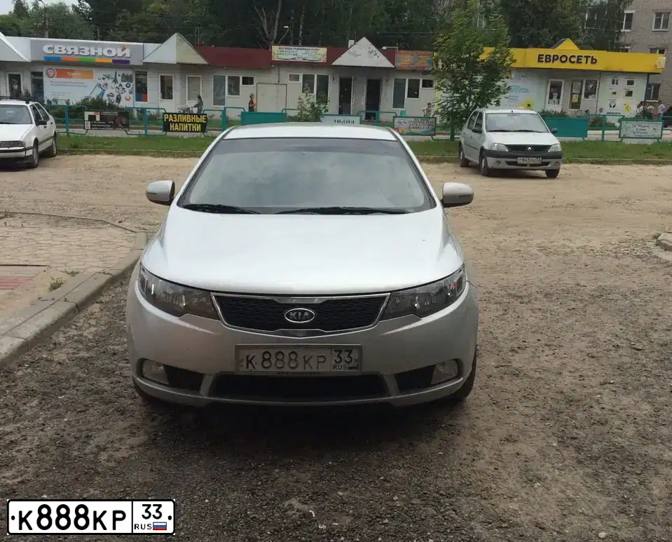 Фото автомобиля KIA CERATO, 2011 — госномер О350ТО33. Цвет: Серебристый