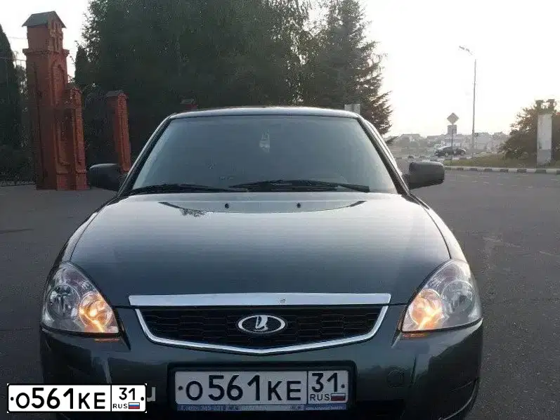 Фото автомобиля LADA 2172 PRIORA, 2011 — госномер Р109АЕ48. Цвет: Серо-сине-зеленый