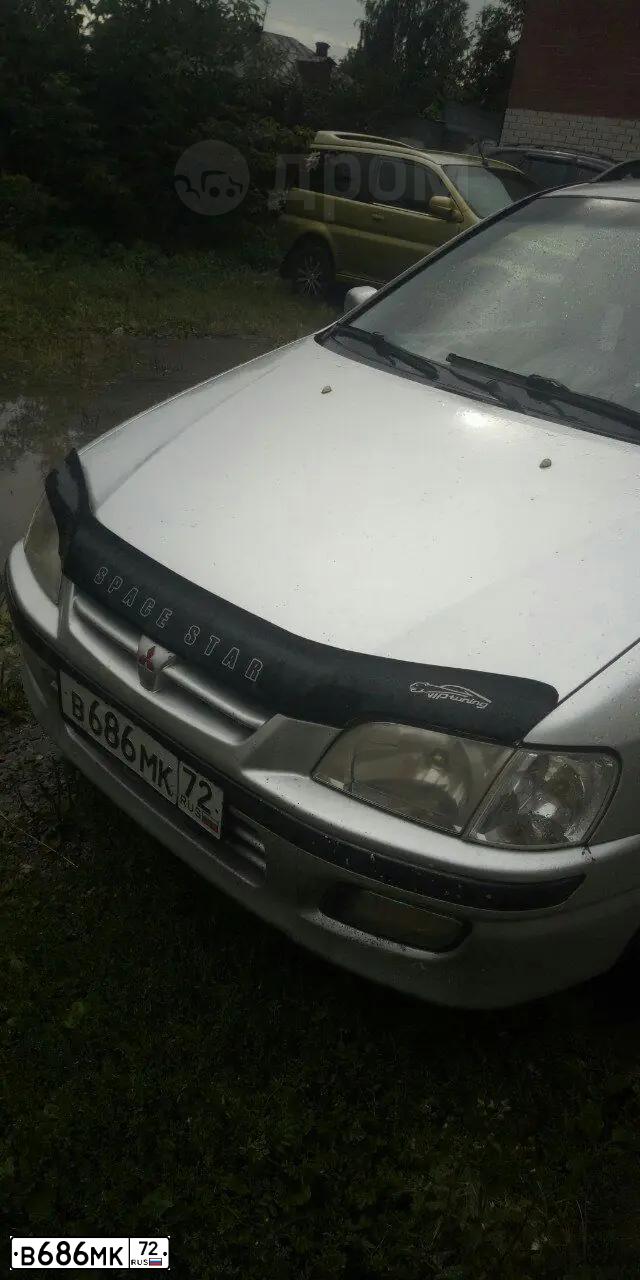 Фото автомобиля MITSUBISHI SPACE STAR, 2001 — госномер В686МК72. Цвет: БЕЛЫЙ-СЕРЕБРИСТЫЙ