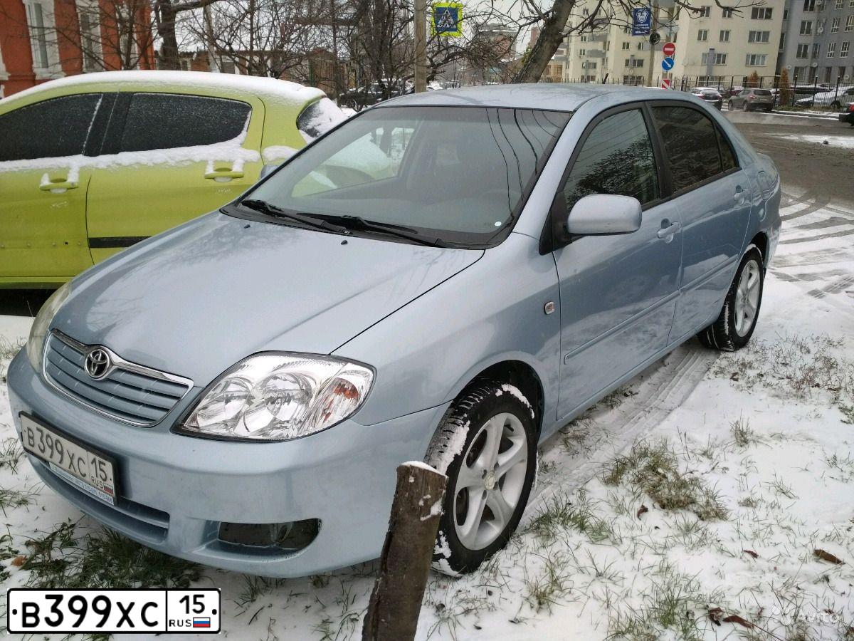 Фото автомобиля TOYOTA COROLLA, 2006 — госномер В399ХС15. Цвет: СВЕТЛО-ГОЛУБОЙ
