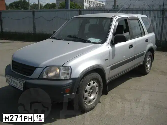 Фото автомобиля HONDA CR-V, 1998 — госномер Н545НВ124. Цвет: СЕРЫЙ