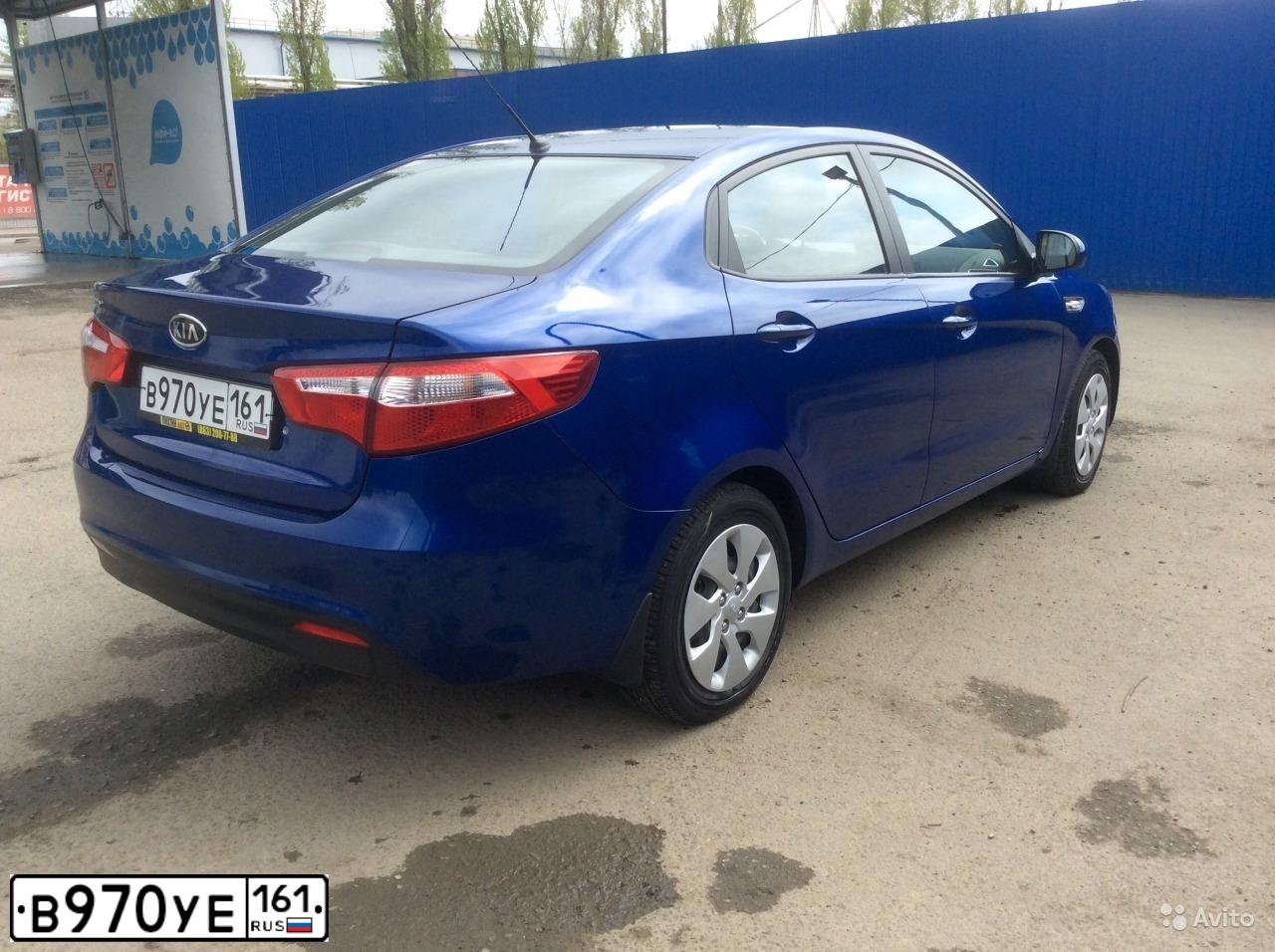 Фото автомобиля KIA RIO, 2011 — госномер В970УЕ161. Цвет: СИНИЙ