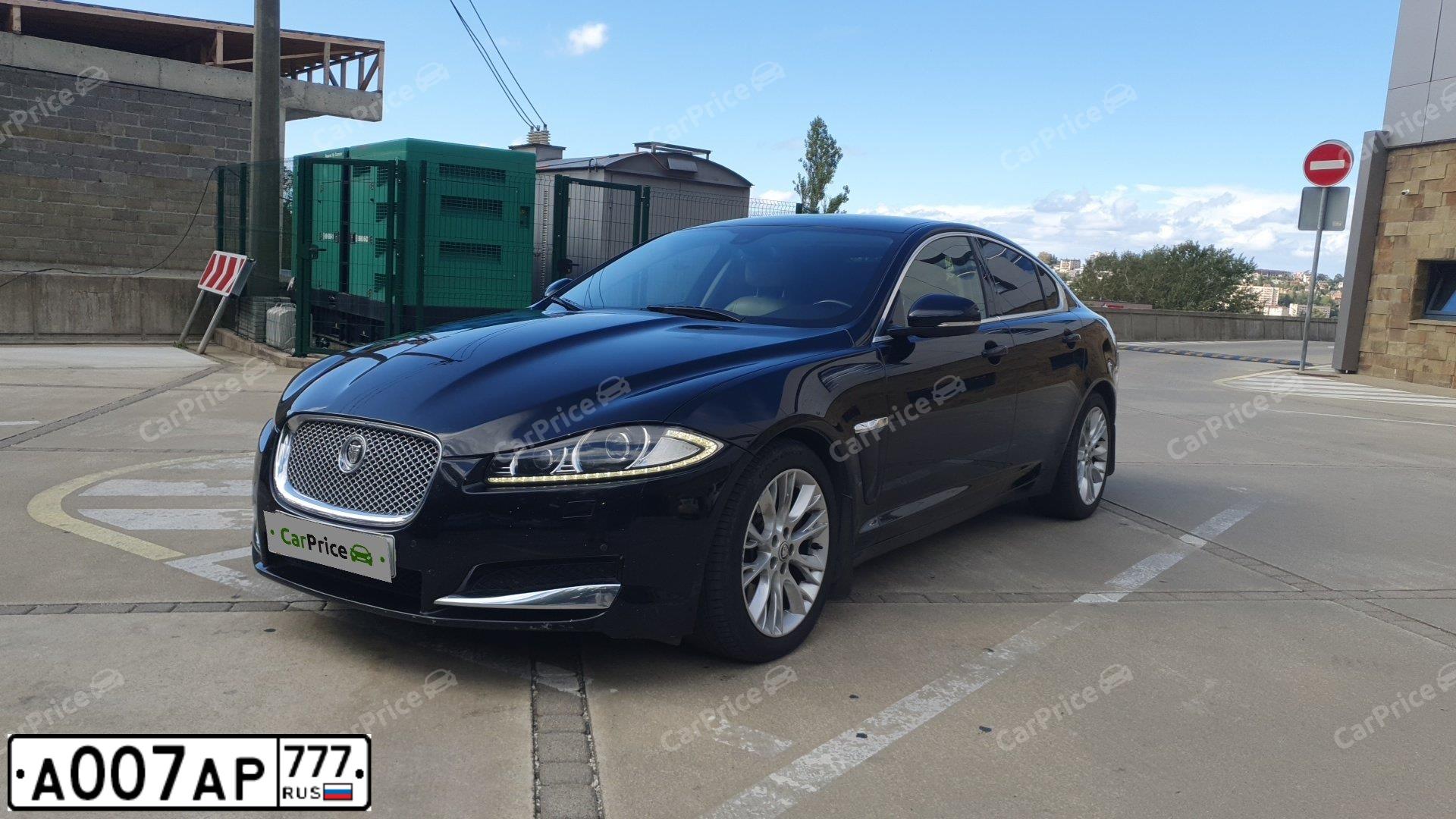 Фото автомобиля FORD FOCUS, 2012 — госномер А163АР777. Цвет: ЧЕРНЫЙ
