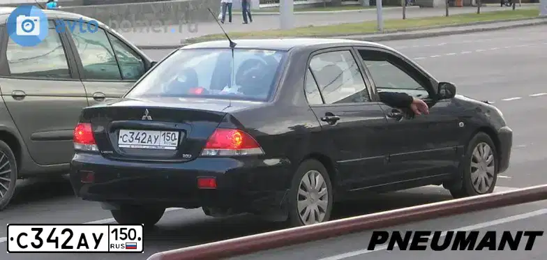 Фото автомобиля MITSUBISHI LANCER, 2006 — госномер М230ЕВ50. Цвет: ЧЕРНЫЙ