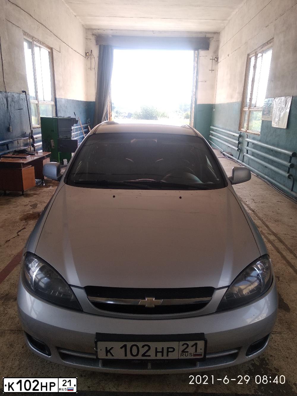 Фото автомобиля CHEVROLET LACETTI, 2011 — госномер С573АН12. Цвет: серебристый