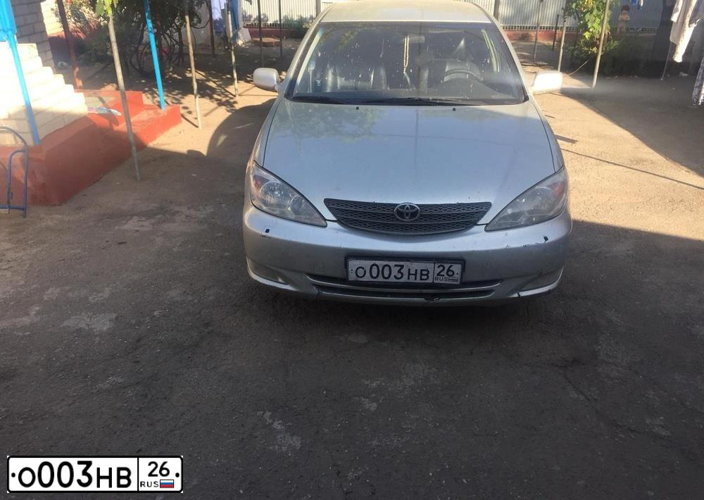 Фото автомобиля LADA 2170 PRIORA, 2016 — госномер О003НВ26. Цвет: Белый