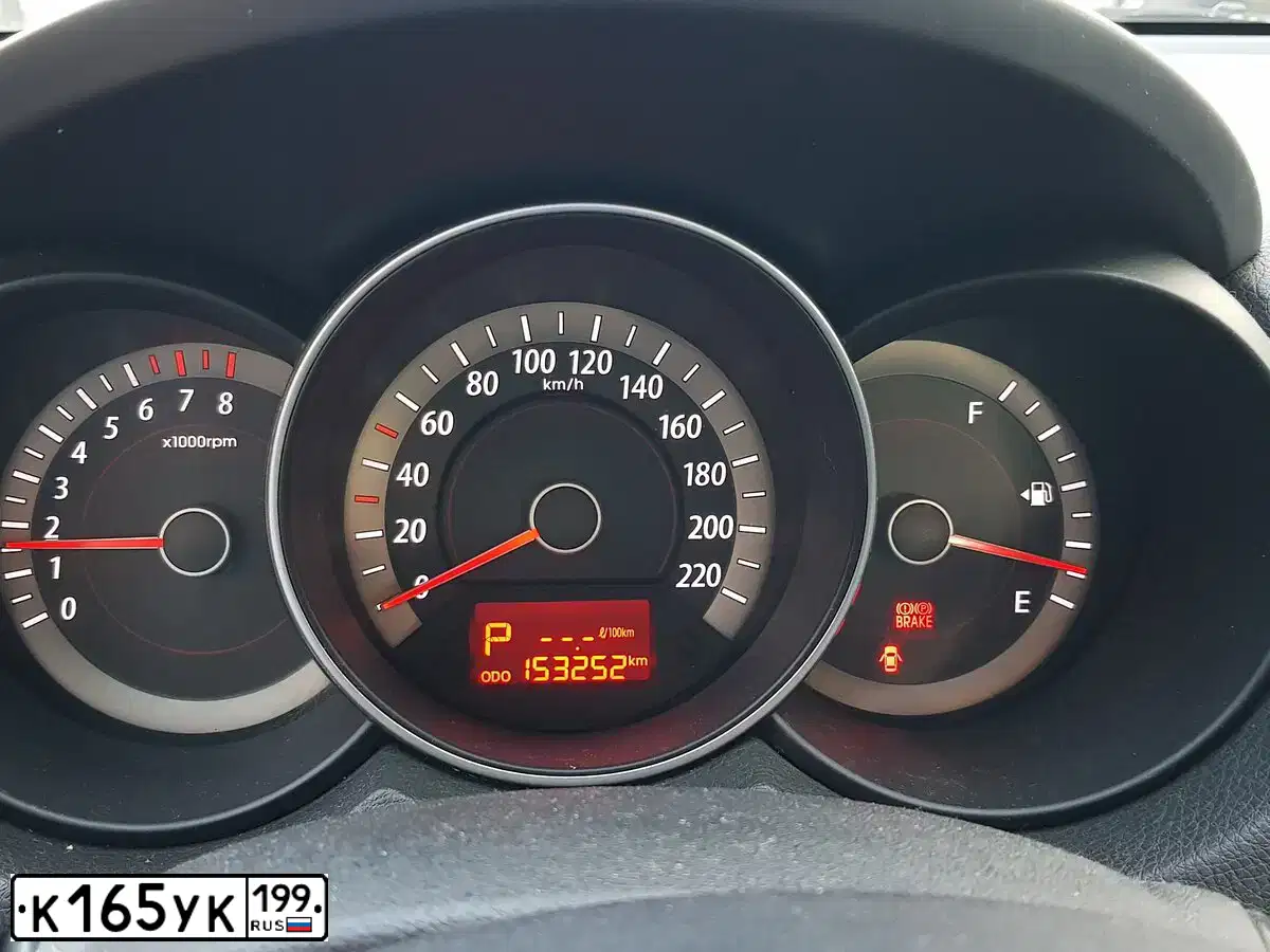 Фото автомобиля KIA CERATO, 2009 — госномер К165УК199. Цвет: БРОНЗОВЫЙ