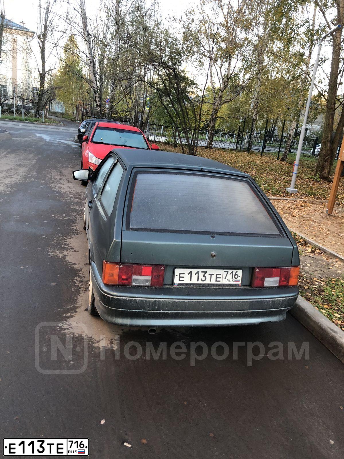 Фото автомобиля LADA 2113 SAMARA, 2011 — госномер Е113ТЕ716. Цвет: СЕРО-СИНЕ-ЗЕЛЕНЫЙ