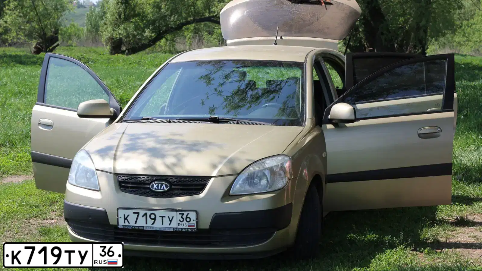 Фото автомобиля KIA RIO, 2006 — госномер К719ТУ36. Цвет: БЕЖЕВЫЙ
