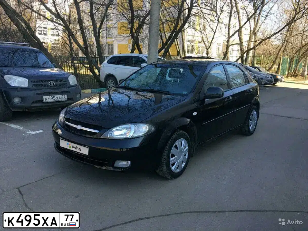 Фото автомобиля TOYOTA RAV4, 2003 — госномер К495ХА77. Цвет: ЧЕРНЫЙ