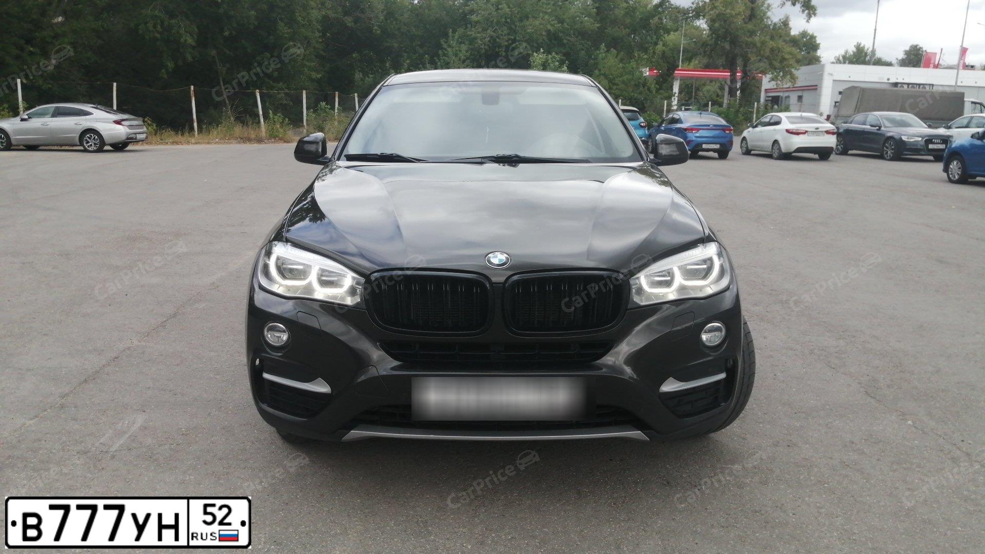 Фото автомобиля BMW X6, 2015 — госномер Р070ОС152. Цвет: Коричневый