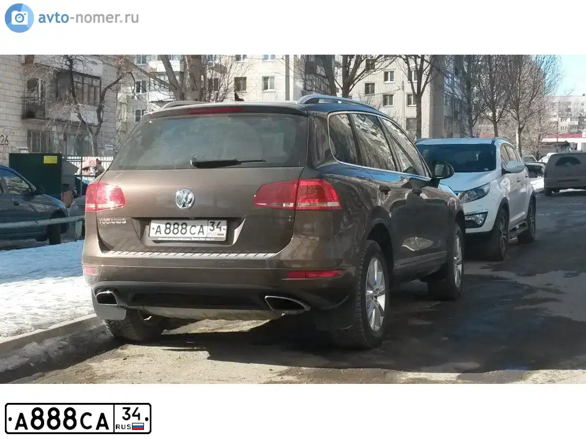 Фото автомобиля VOLKSWAGEN TOUAREG, 2011 — госномер В529ВМ761. Цвет: Коричневый