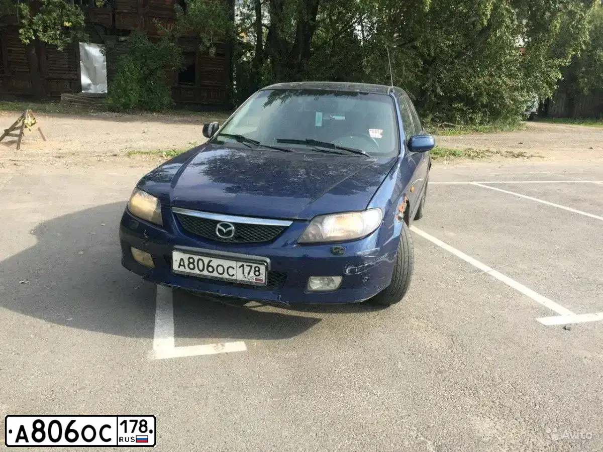Фото автомобиля MAZDA 323, 2003 — госномер А806ОС178. Цвет: ТЕМНО-СИНИЙ