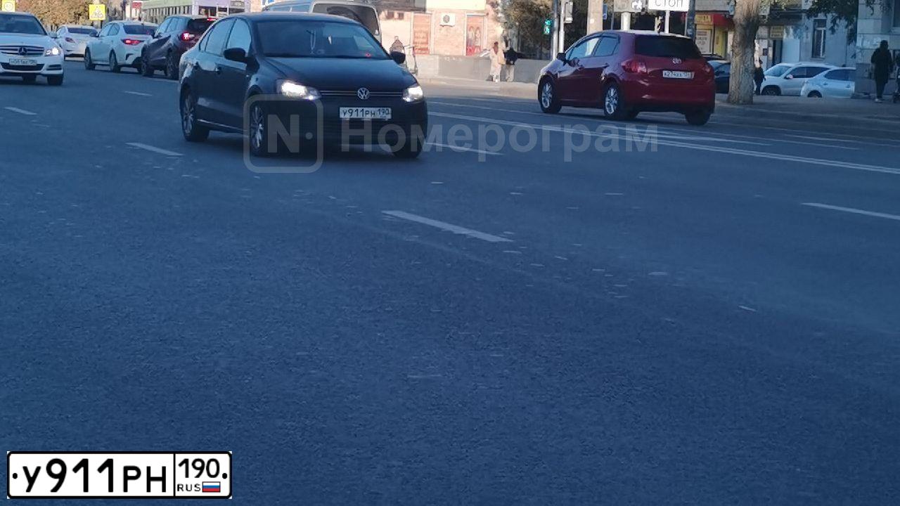 Фото автомобиля VOLKSWAGEN POLO, 2011 — госномер У911РН190. Цвет: ЧЕРНЫЙ
