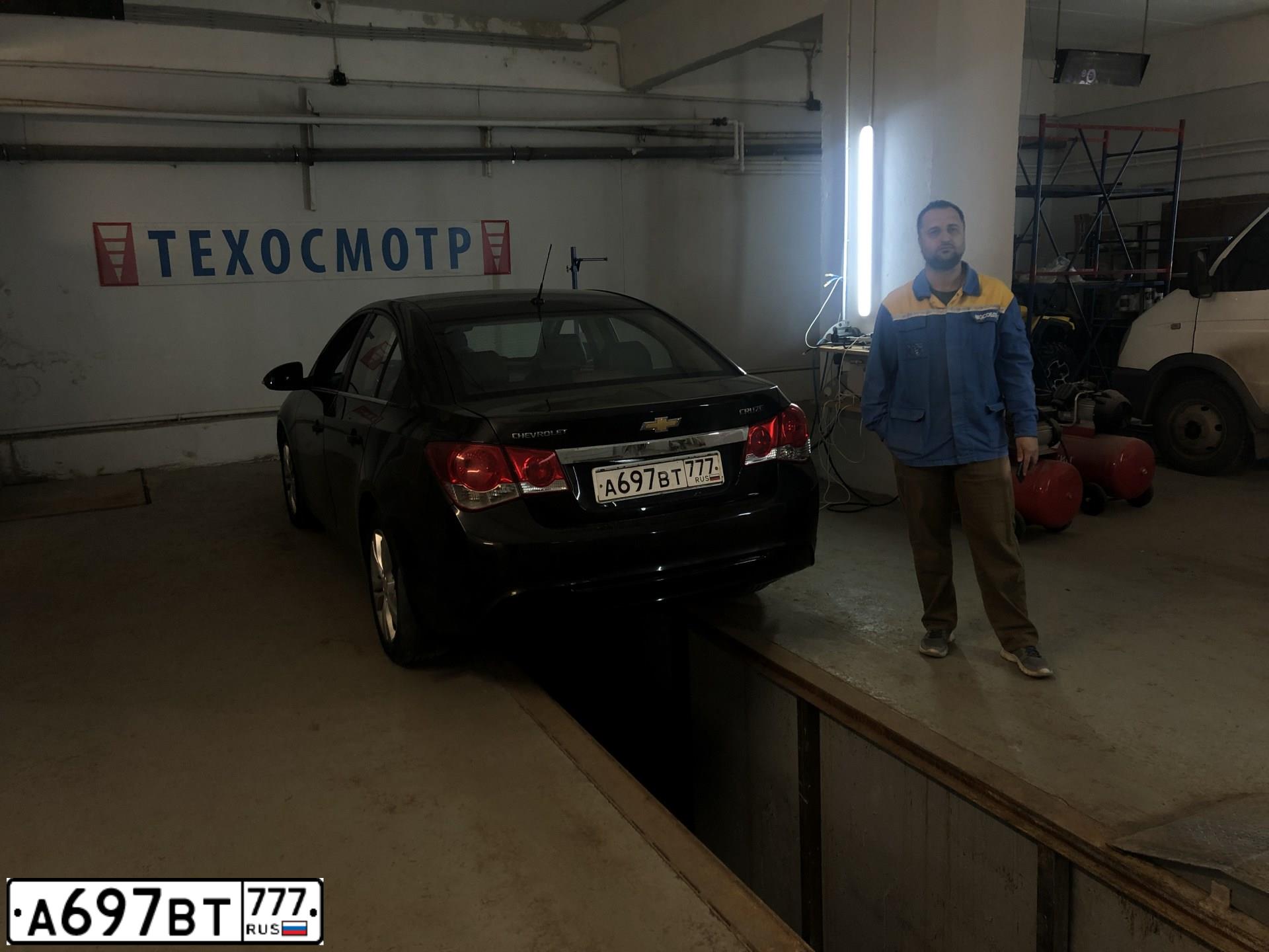 Фото автомобиля CHEVROLET CRUZE, 2013 — госномер А697ВТ777. Цвет: ЧЕРНЫЙ МЕТАЛЛИК