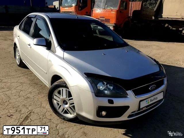 Фото автомобиля FORD D FOCUS, 2005 — госномер Т951ТР71. Цвет: СЕРЕБРИСТЫЙ
