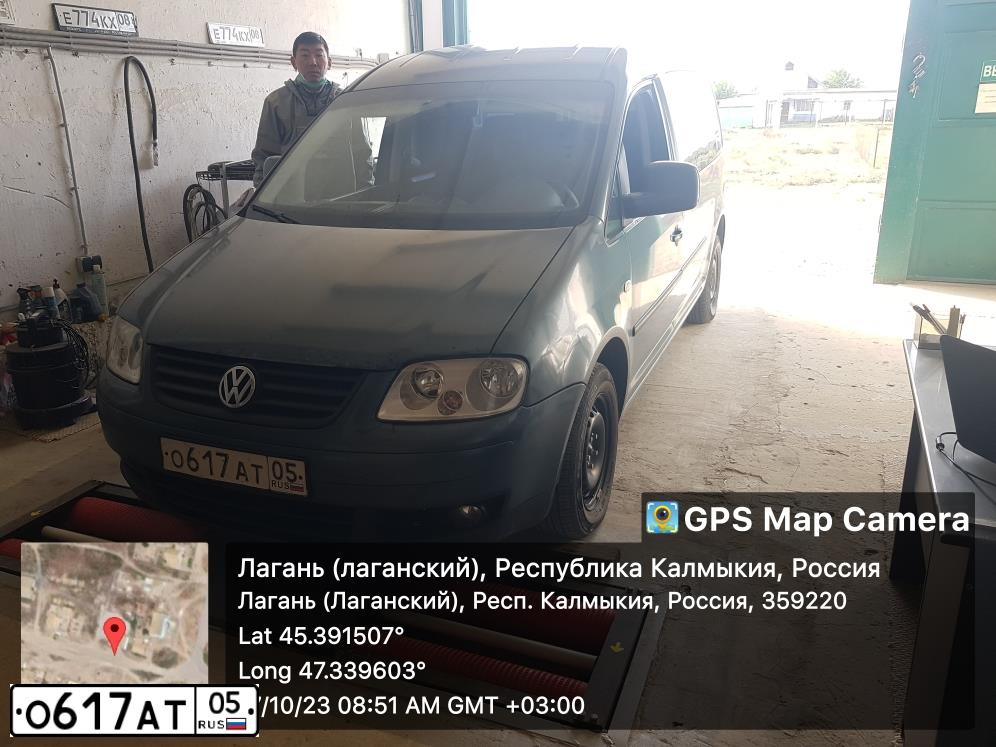 Фото автомобиля VOLKSWAGEN CADDY, 2010 — госномер Е514НН08. Цвет: ТЕМНО-СЕРЫЙ