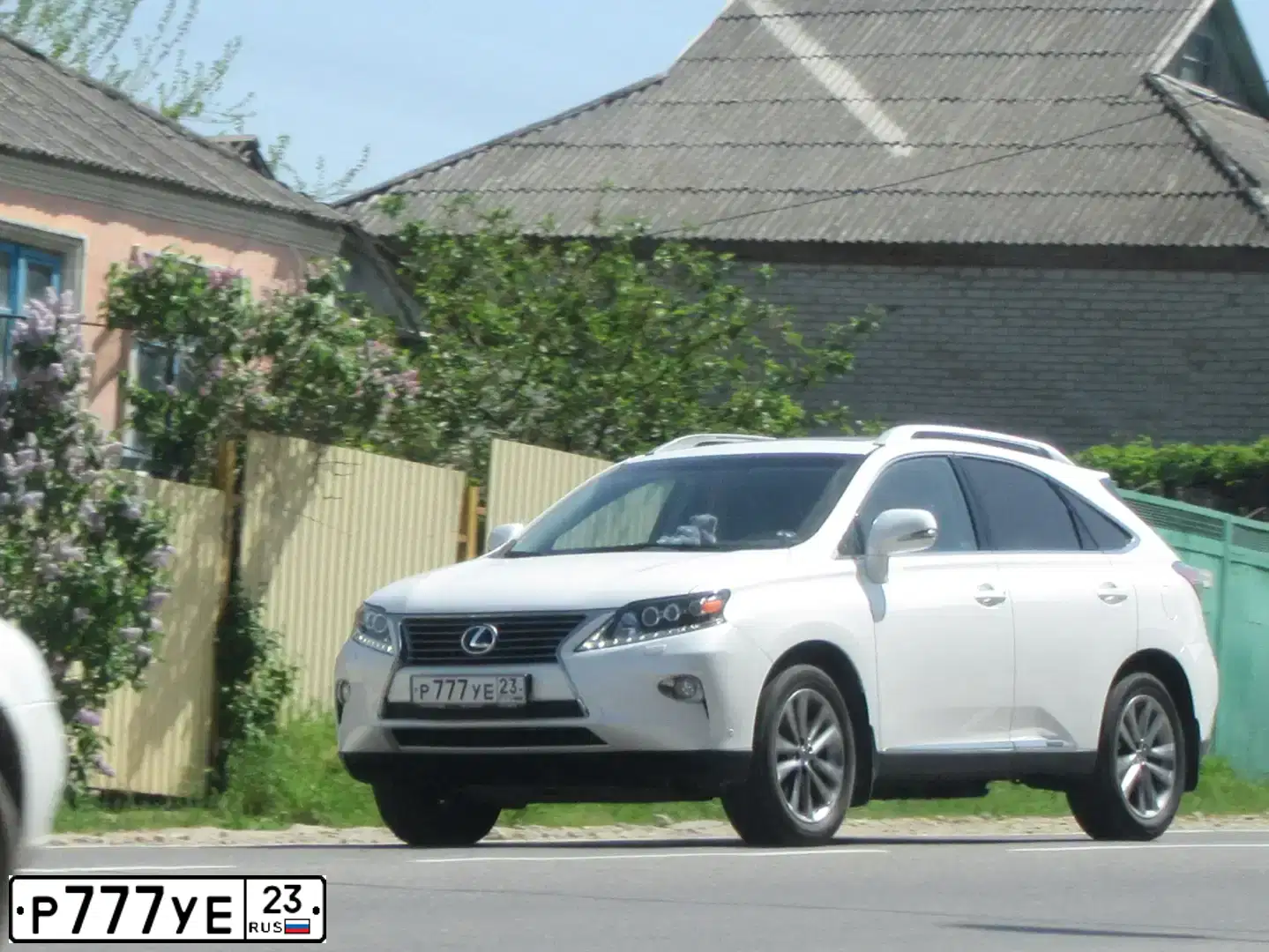 Фото автомобиля LEXUS RX, 2015 — госномер Р777УЕ23. Цвет: Белый