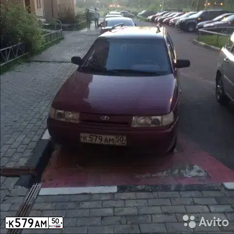 Фото автомобиля LADA 2111, 2005 — госномер К579АМ50. Цвет: КРАСНЫЙ ТЕМНЫЙ