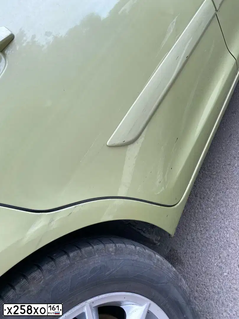 Фото автомобиля OPEL CORSA, 2007 — госномер Х258ХО161. Цвет: СВЕТЛО-ЗЕЛЕНЫЙ