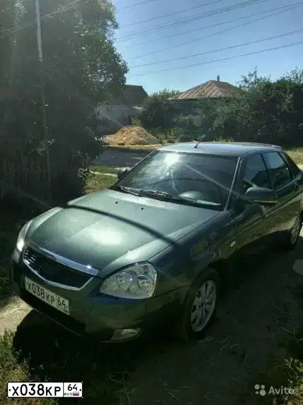 Фото автомобиля LADA PRIORA, 2010 — госномер К431НР164. Цвет: Серо-сине-зеленый