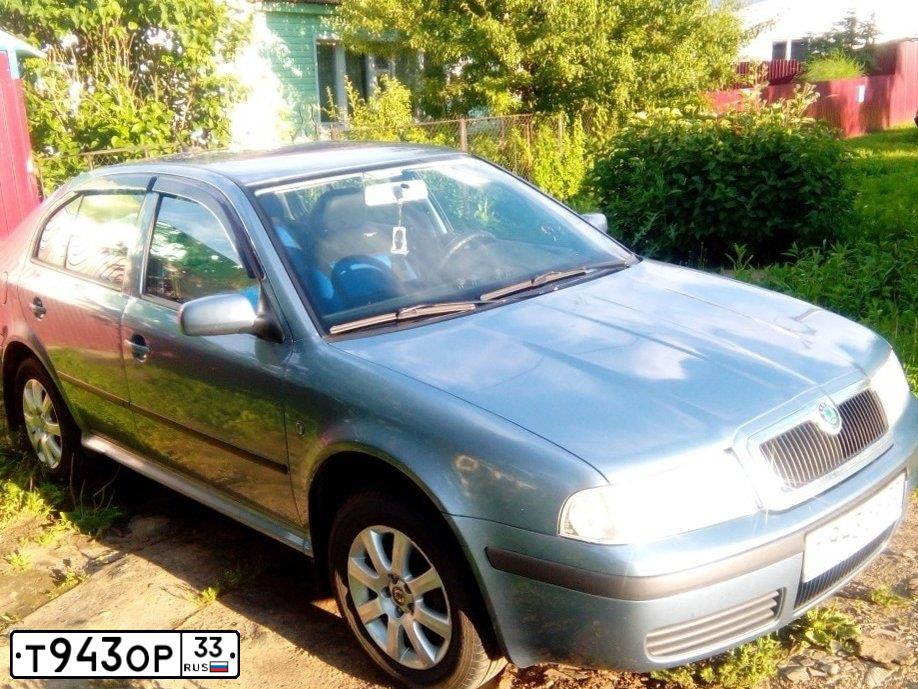 Фото автомобиля SKODA OCTAVIA, 2008 — госномер Т943ОР33. Цвет: СЕРО-ГОЛУБОЙ