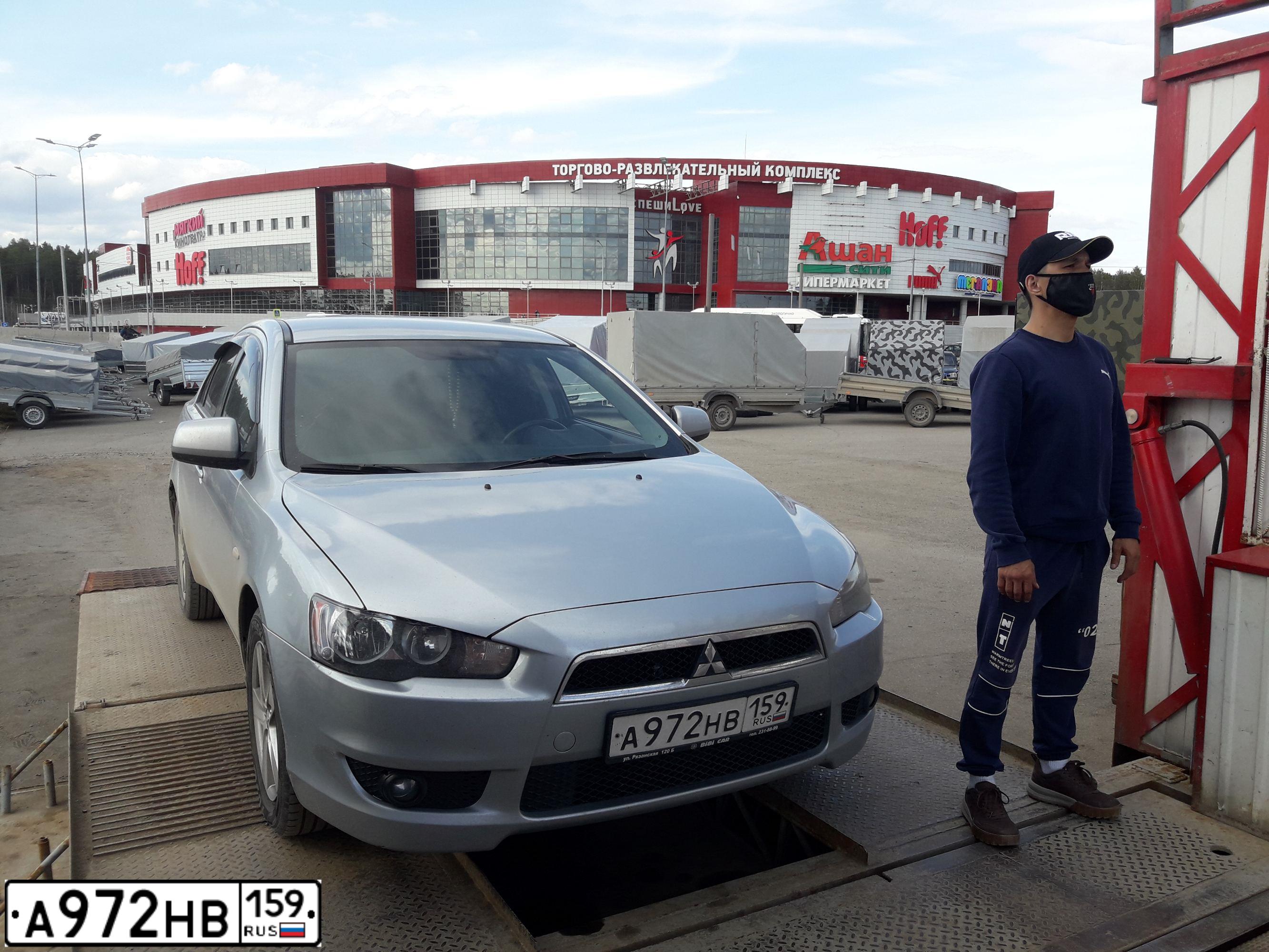 Фото автомобиля MITSUBISHI LANCER, 2008 — госномер Р441ЕА159. Цвет: Серебристый
