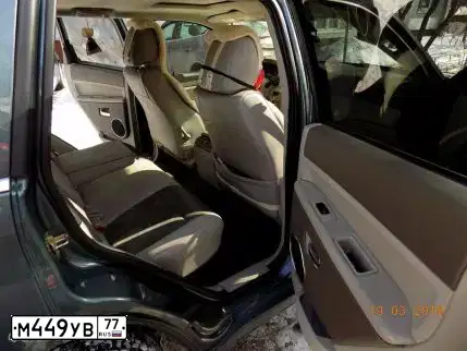 Фото автомобиля JEEP GRAND CHEROKEE, 2006 — госномер М449УВ77. Цвет: СЕРО-ЗЕЛЕНЫЙ