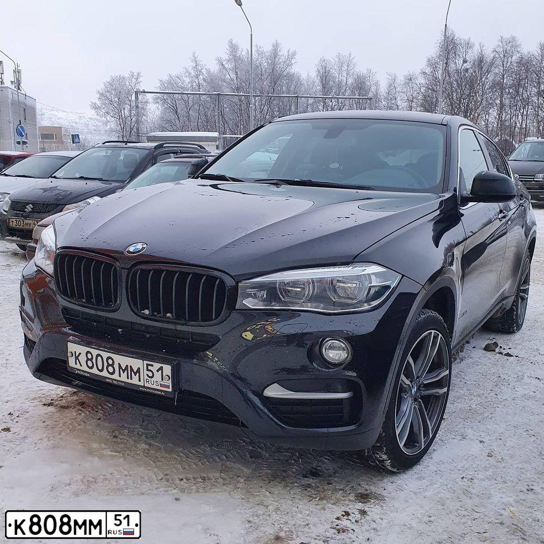 Фото автомобиля BMW X6, 2009 — госномер В701ОН51. Цвет: ЧЕРНЫЙ