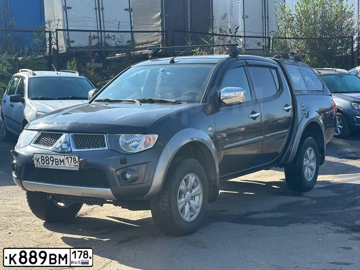 Фото автомобиля MITSUBISHI L 200, 2011 — госномер К889ВМ178