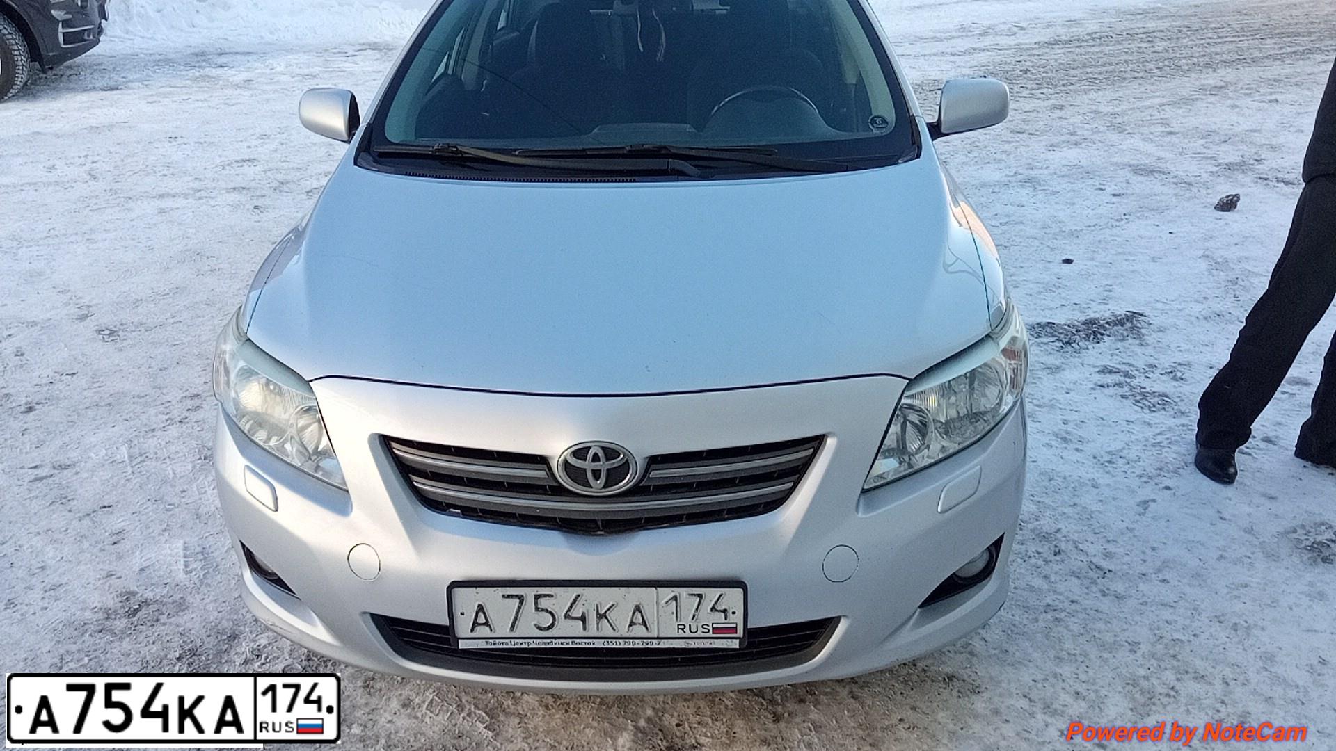 Фото автомобиля TOYOTA COROLLA, 2008 — госномер А754КА174. Цвет: СЕРЕБРИСТЫЙ