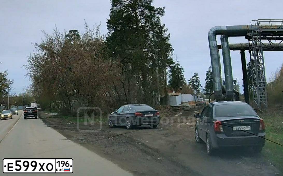 Фото автомобиля CHEVROLET LACETTI, 2010 — госномер Е599ХО196. Цвет: ЧЕРНЫЙ