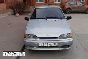 Фото автомобиля LADA 2114 SAMARA, 2008 — госномер Т747МЕ93. Цвет: Серебристо Желто-Голубой