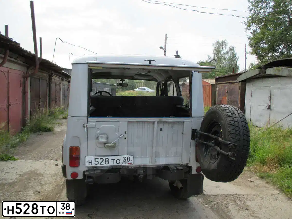 Фото автомобиля UAZ 3151 / HUNTER, 1998 — госномер Н528ТО38. Цвет: СЕРЫЙ