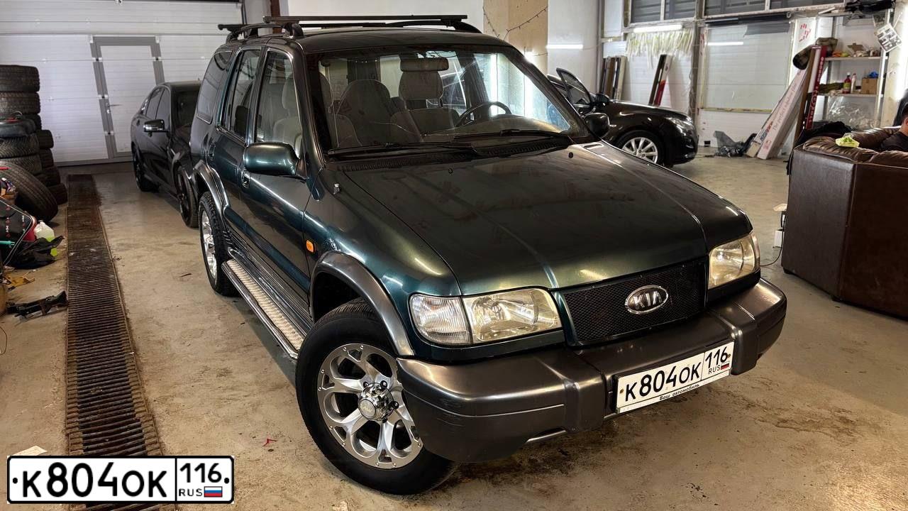 Фото автомобиля KIA SPORTAGE, 2002 — госномер К804ОК116. Цвет: ЗЕЛЕНЫЙ