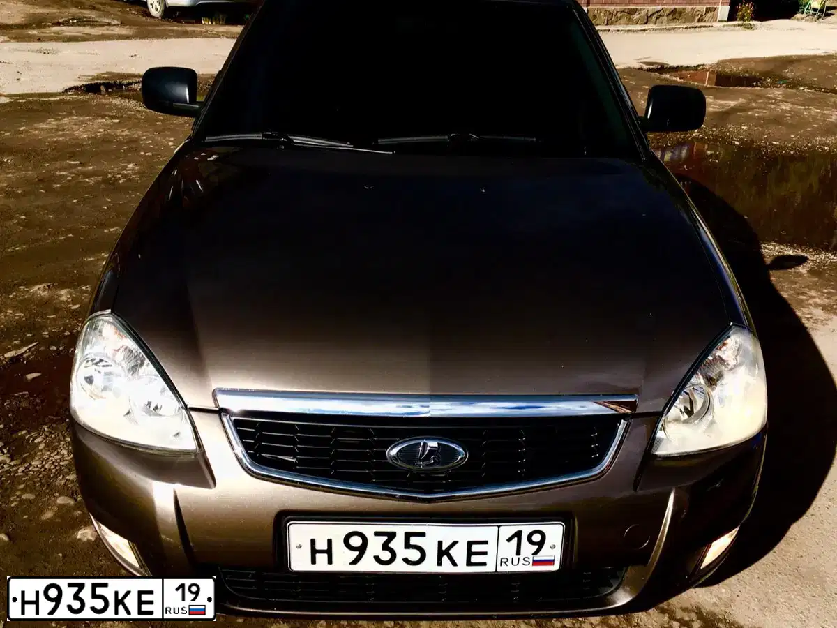 Фото автомобиля LADA PRIORA, 2015 — госномер Е789ВО17. Цвет: Золотисто-коричневый